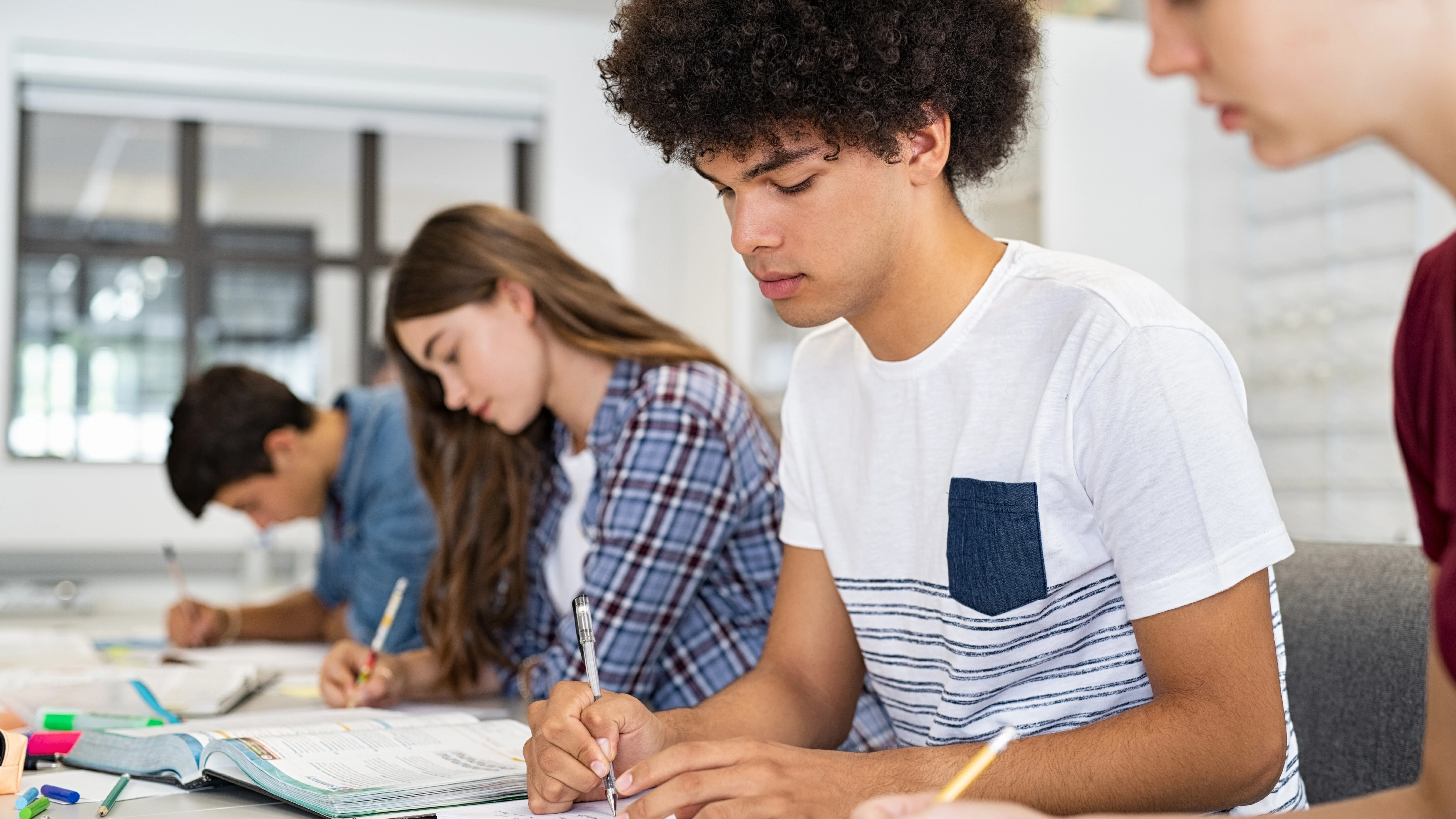 Students learning in a classroom.